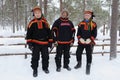 Three Sami men in snow in Lapland, Finland Royalty Free Stock Photo